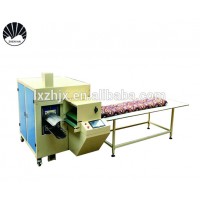 Quilt coiling machine